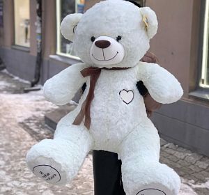 Мягкие игрушки — Белый медведь гигант с сердечком на груди и лентой